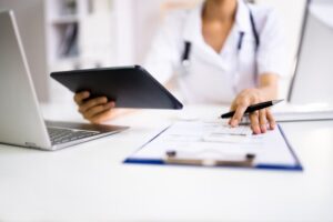 Hospital staff auditing and billing using medical bill codes