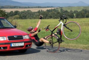 Speeding Car collides cyclist on the road