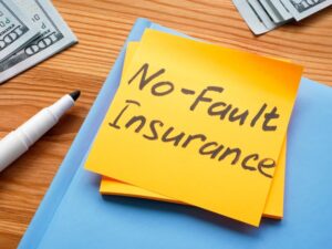 No-Fault Insurance written on a sticky note