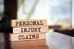 Wooden blocks with words 'Personal injury claims'.