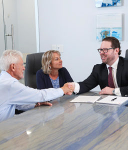 Attorney Michael K. Grife meeting with clients